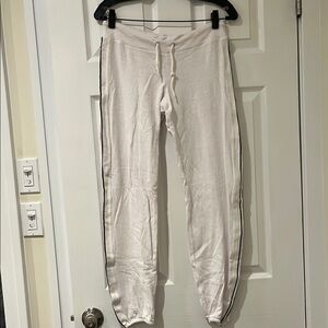 White Monrow sweatpants with black stripe down leg